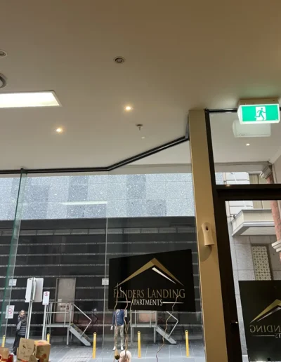 Commercial interior painting project completed by Power Brush Painting, featuring a professionally finished reception and shopfront area.
